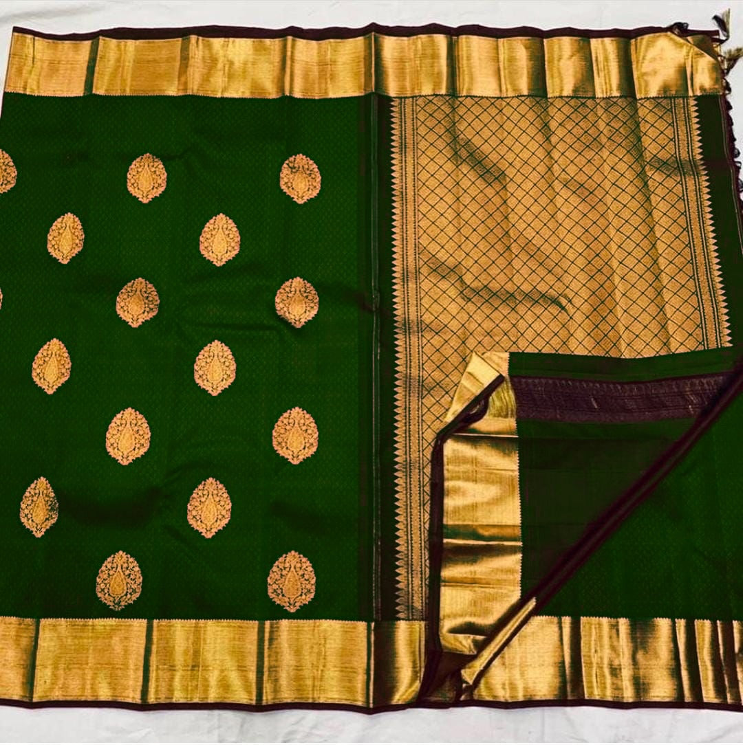 Radiating Dark Green Color Banarasi Soft Silk Saree With Blouse Piece