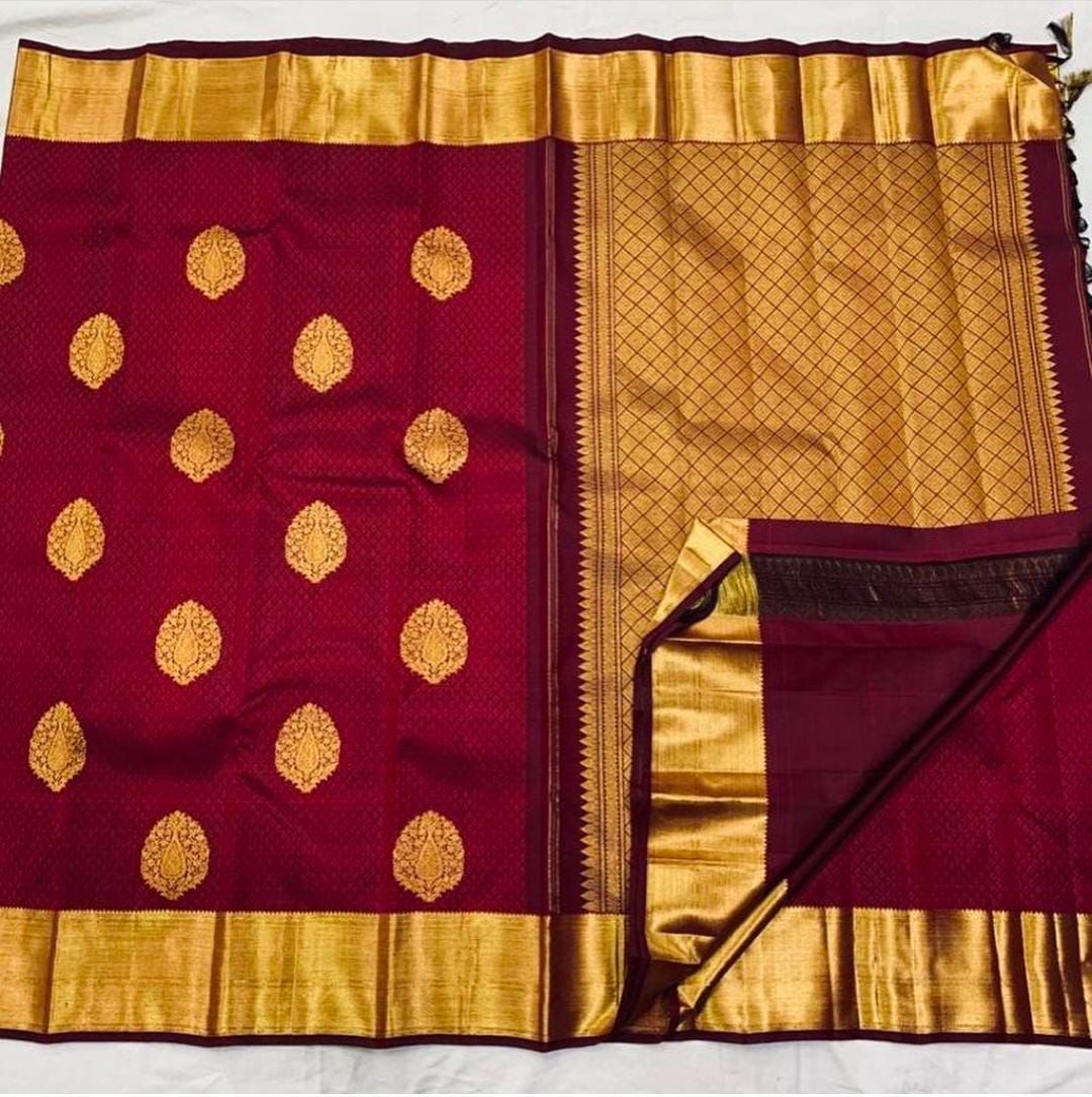 Enrapturing Maroon Color Banarasi Soft Silk Saree With Blouse Piece