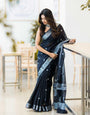 Glazed Black Color Soft Lichi Silk Saree With Blouse Piece