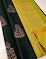 Glamorous Dark Green Color Soft Lichi Silk Saree With Blouse Piece