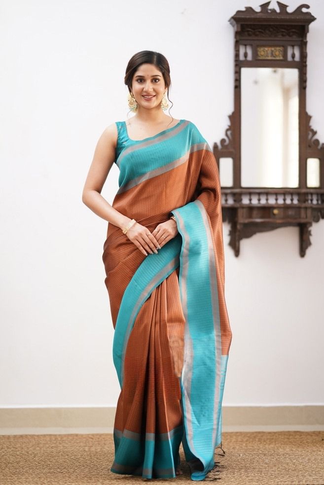 Resplendent Brown Color Soft Lichi Silk Saree With Blouse Piece