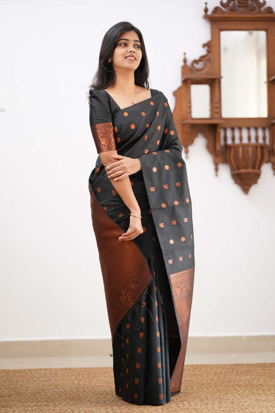 Arousing Black Color Soft Lichi Silk Saree With Blouse Piece