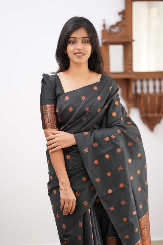 Arousing Black Color Soft Lichi Silk Saree With Blouse Piece