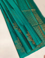 Divine Firozi Color Soft Lichi Silk Saree With Blouse Piece