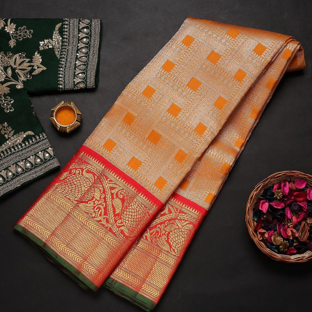 Mellifluous Orange Color Banarasi Soft Silk Saree With Blouse Piece