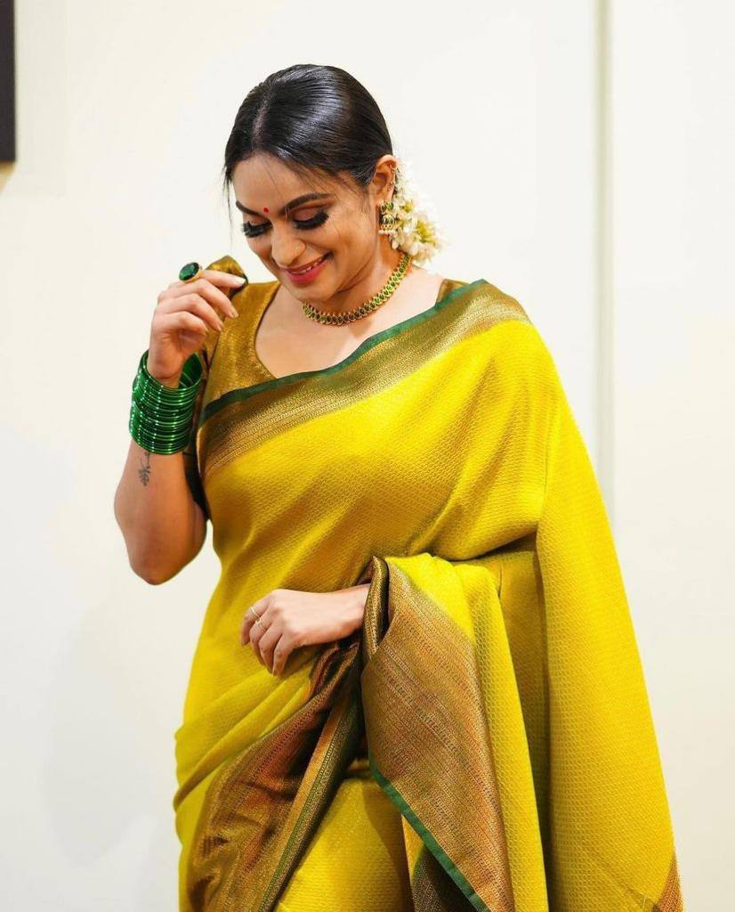 Delicate Yellow Color Soft Lichi Silk Saree With Blouse Piece