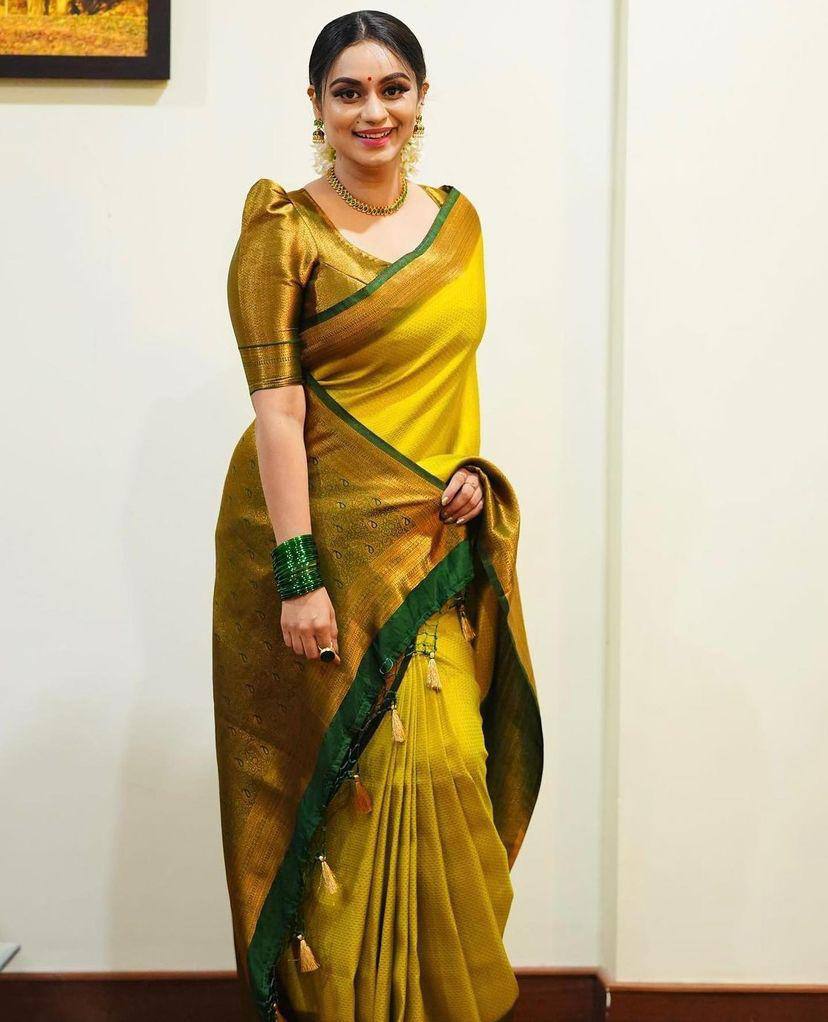 Delicate Yellow Color Soft Lichi Silk Saree With Blouse Piece