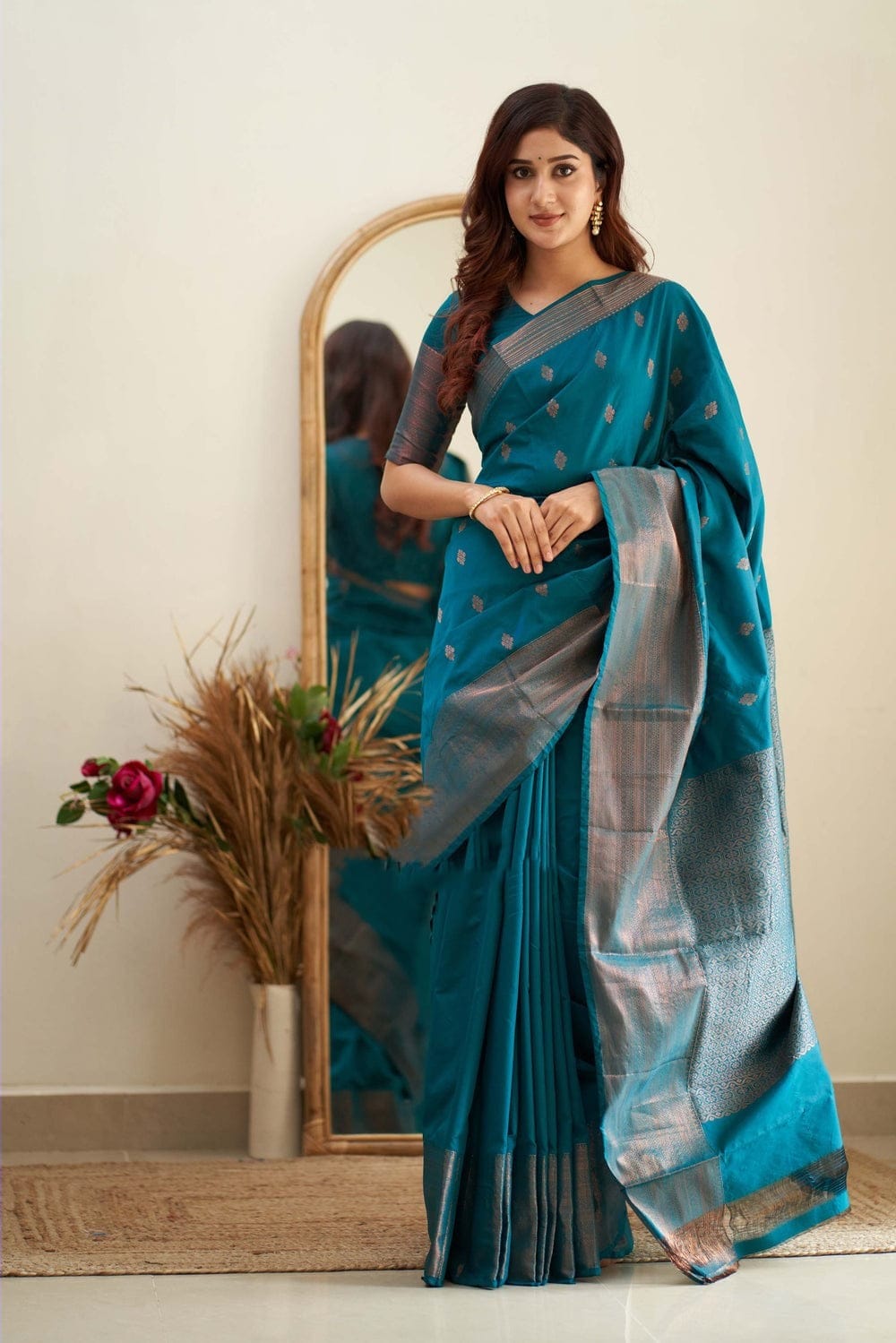 Glamorous Firozi Color Soft Lichi Silk Saree With Blouse Piece