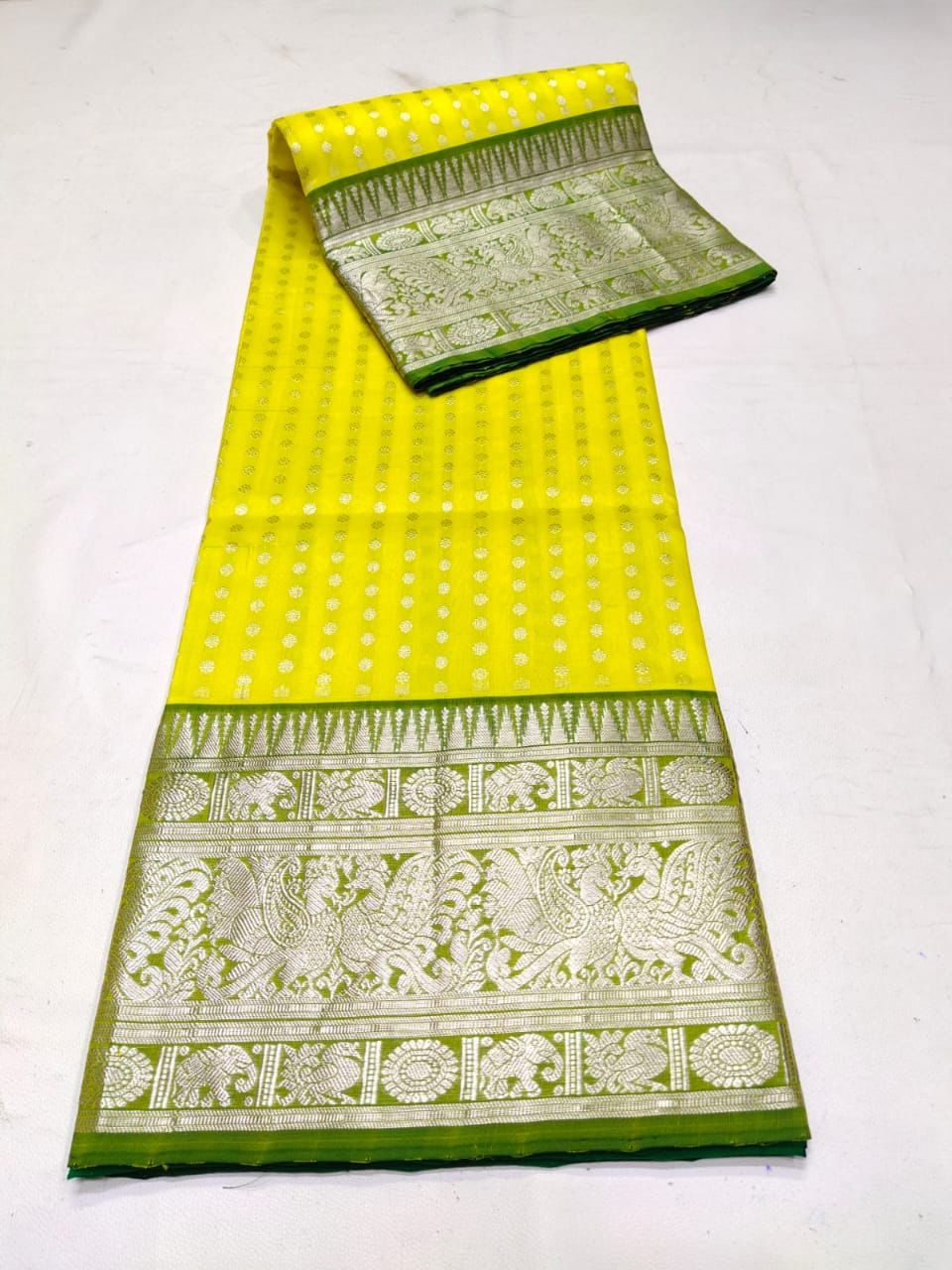 Glamorous Lemon Color Banarasi Soft Silk Saree With Blouse Piece