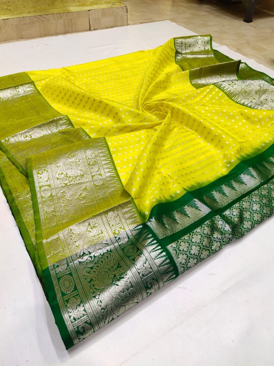 Glamorous Lemon Color Banarasi Soft Silk Saree With Blouse Piece