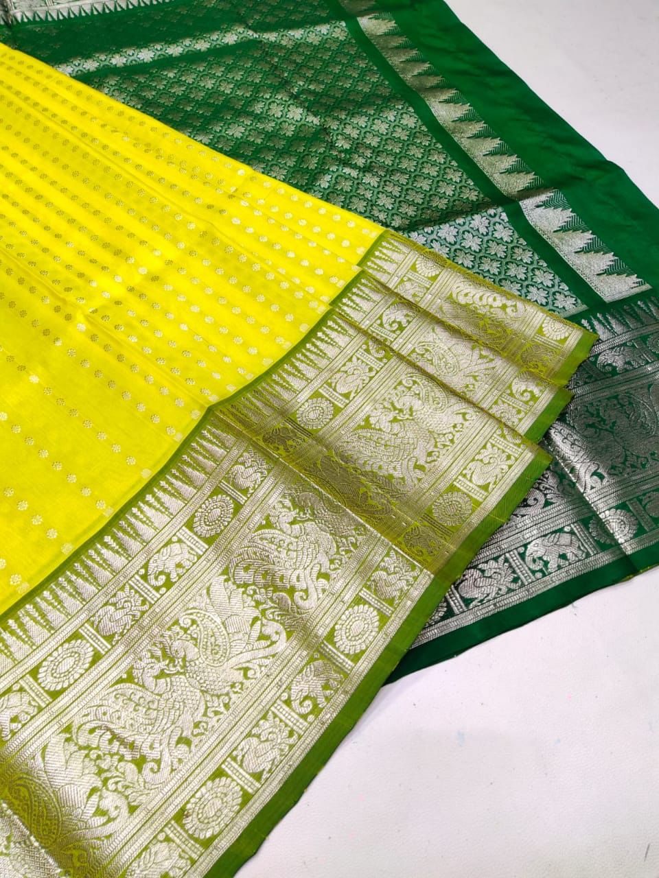 Glamorous Lemon Color Banarasi Soft Silk Saree With Blouse Piece