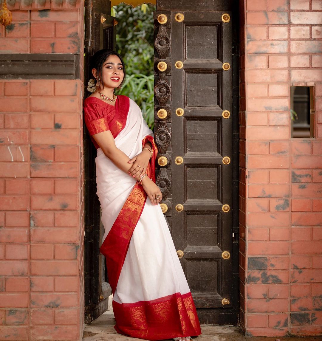 Glamorous White Color Soft Lichi Silk Saree With Blouse Piece