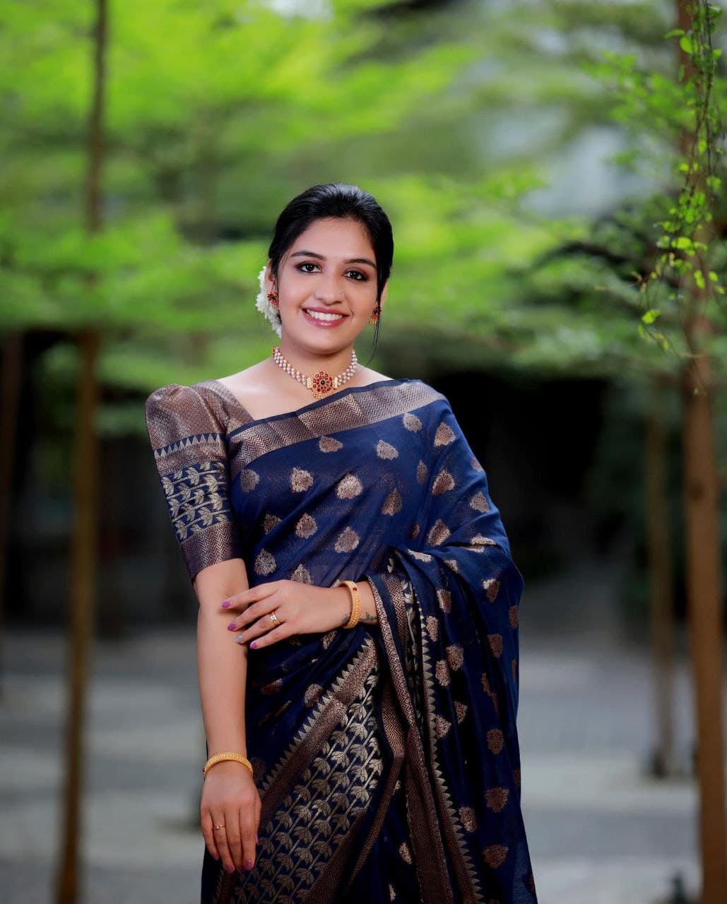 Slick Navy Blue Color Banarasi Soft Silk Saree With Blouse Piece