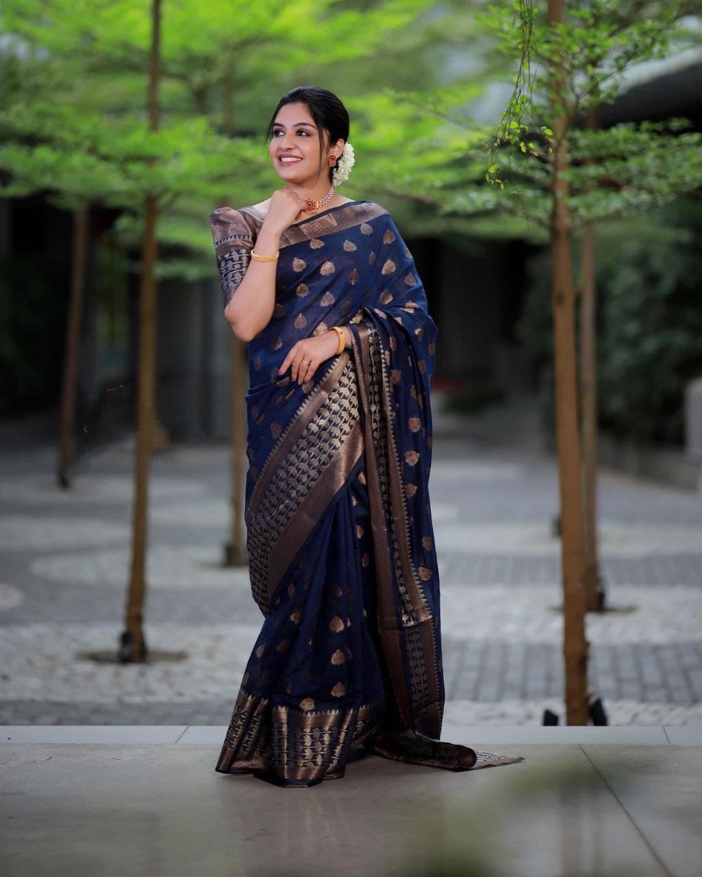 Slick Navy Blue Color Banarasi Soft Silk Saree With Blouse Piece