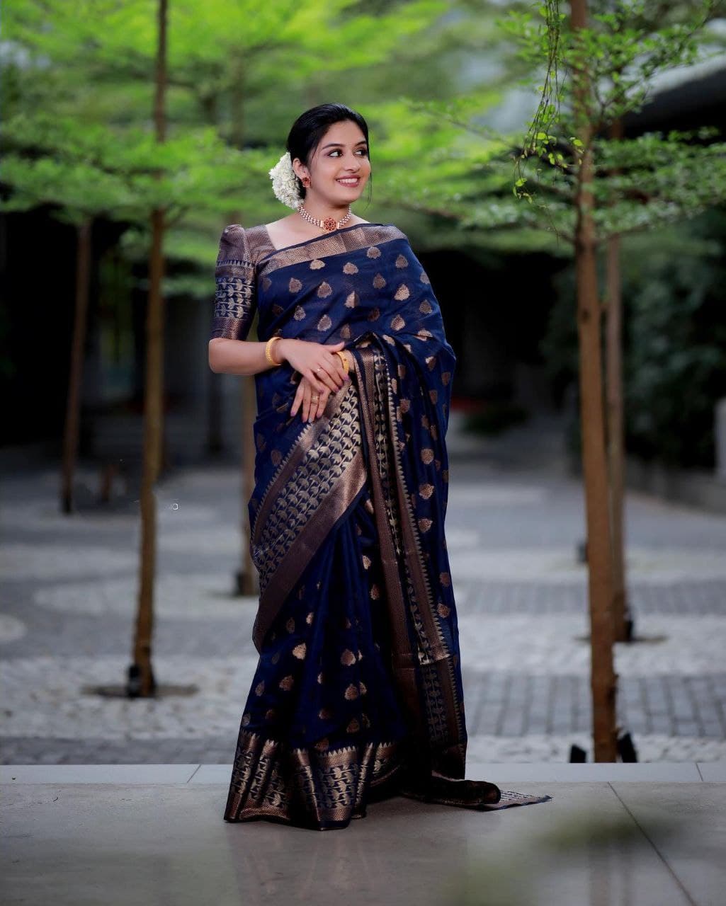 Slick Navy Blue Color Banarasi Soft Silk Saree With Blouse Piece