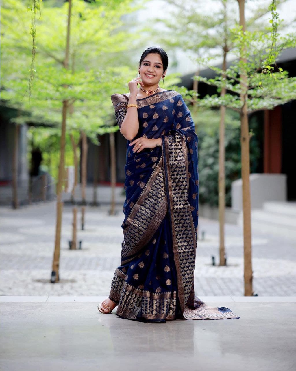 Slick Navy Blue Color Banarasi Soft Silk Saree With Blouse Piece