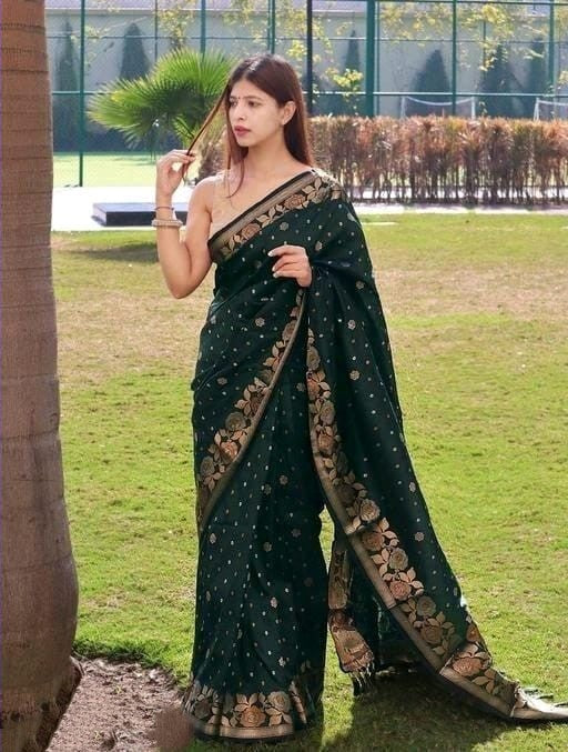 Dazzling Dark Green Color Banarasi Soft Silk Saree With Blouse Piece