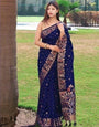 Reflective Navy Blue Color Banarasi Soft Silk Saree With Blouse Piece