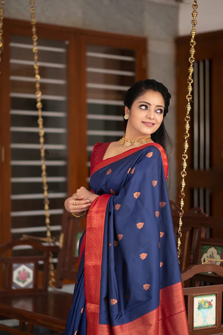 Breathtaking Blue Color Soft Lichi Silk Saree With Blouse Piece