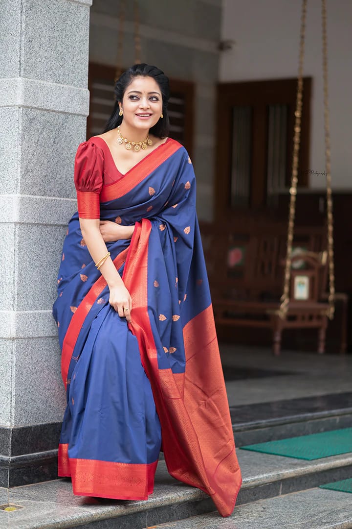 Breathtaking Blue Color Soft Lichi Silk Saree With Blouse Piece