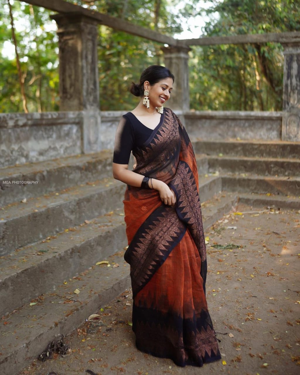 Luminous Orange Color Soft Lichi Silk Saree With Blouse Piece