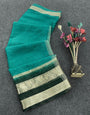 Fervent Sea Green Color Organza Silk Saree With Blouse Piece