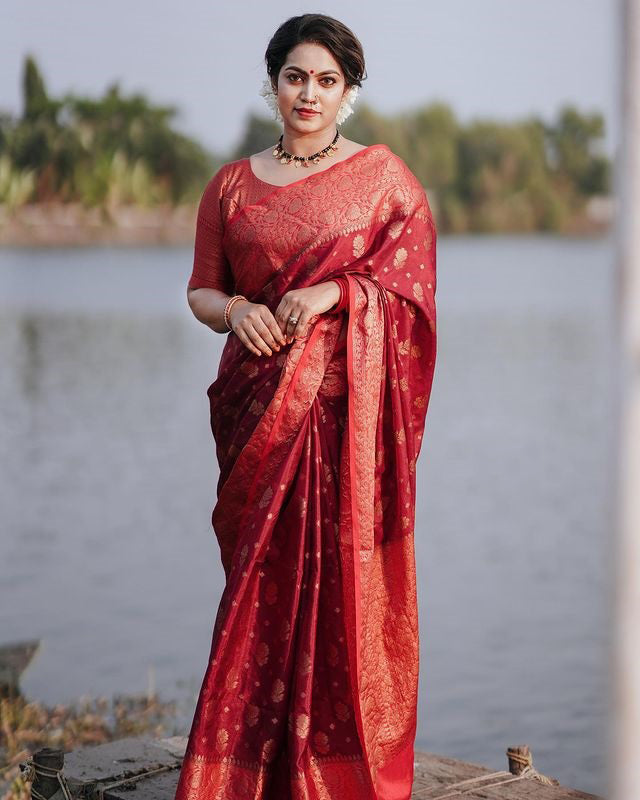 Exquisite Red Color Soft Lichi Silk Saree With Blouse Piece