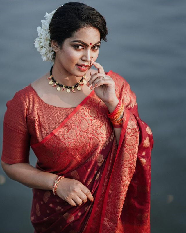 Exquisite Red Color Soft Lichi Silk Saree With Blouse Piece