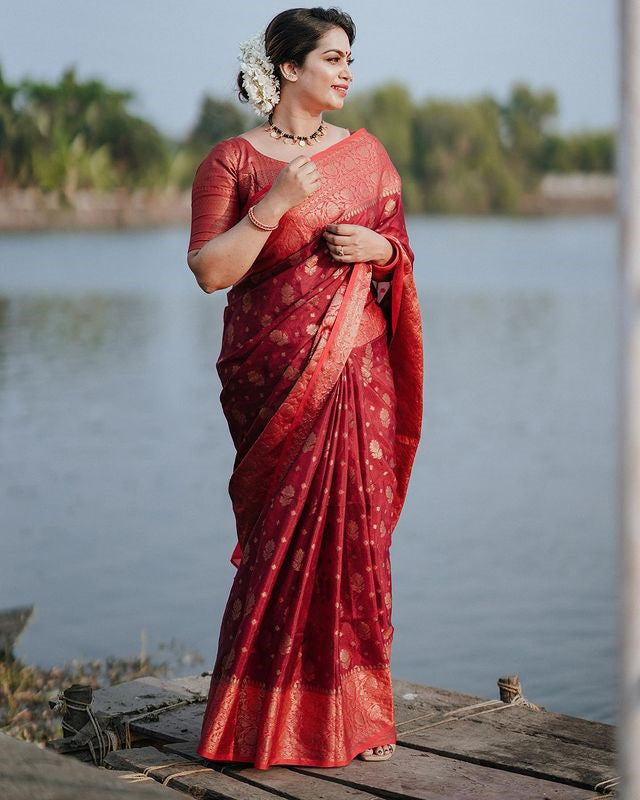 Exquisite Red Color Soft Lichi Silk Saree With Blouse Piece