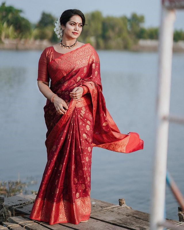 Exquisite Red Color Soft Lichi Silk Saree With Blouse Piece