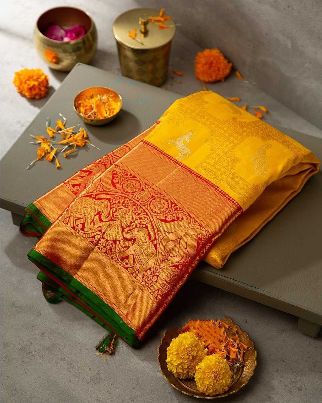 Luminous Yellow Color Banarasi Soft Silk Saree With Blouse Piece