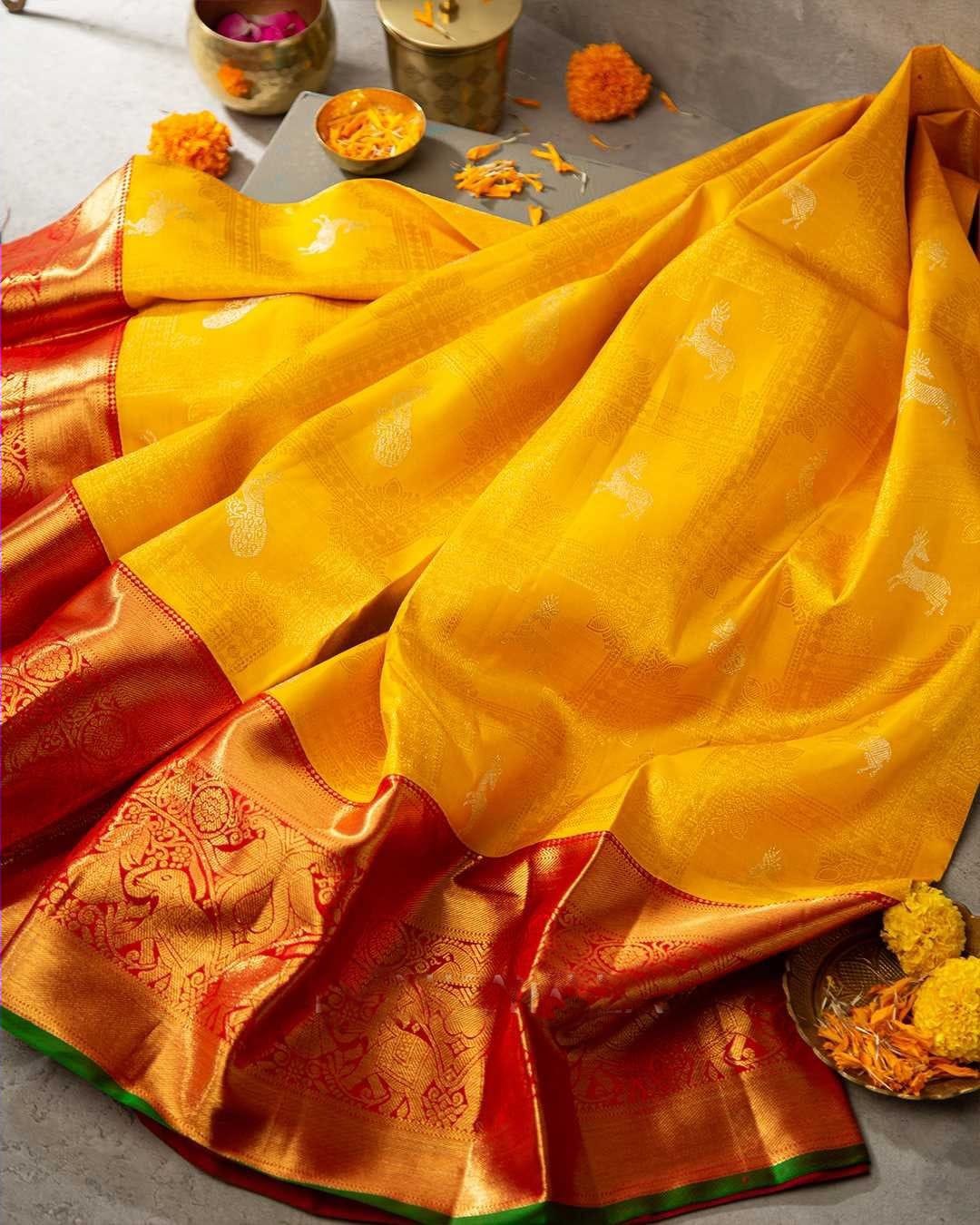 Luminous Yellow Color Banarasi Soft Silk Saree With Blouse Piece