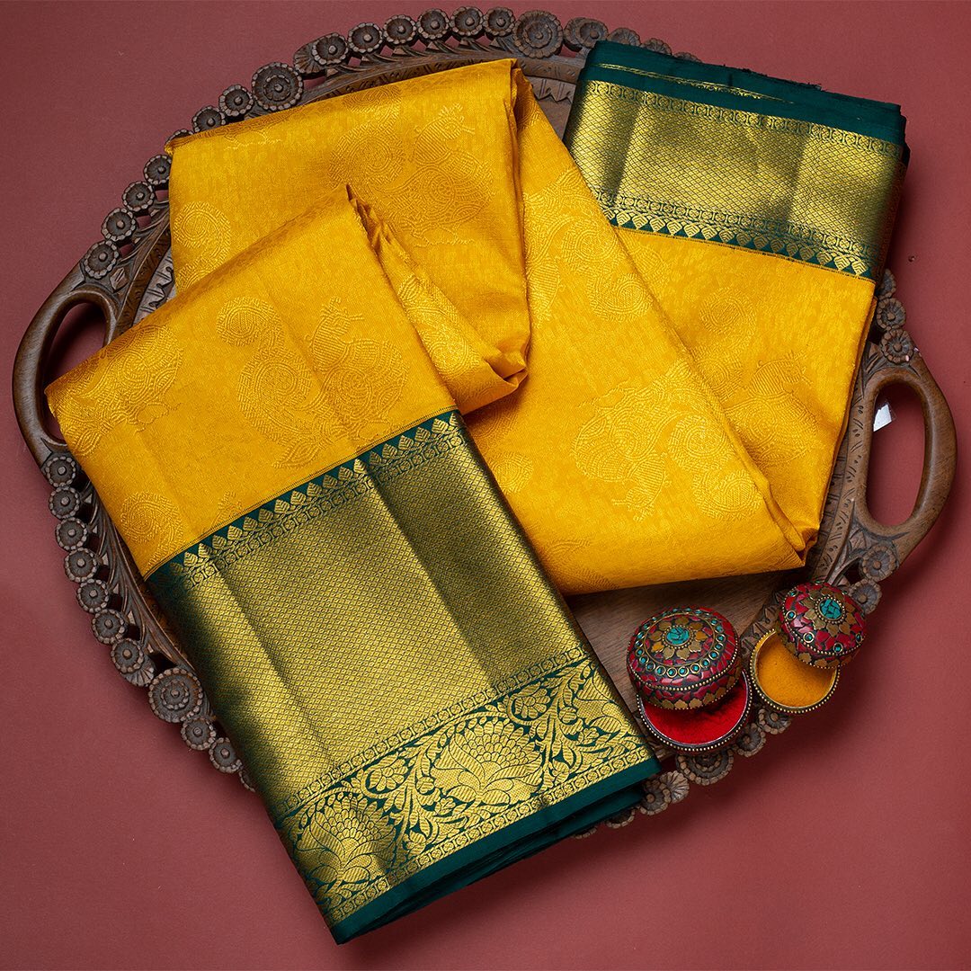 Utopian Yellow Color Banarasi Soft Silk Saree With Blouse Piece