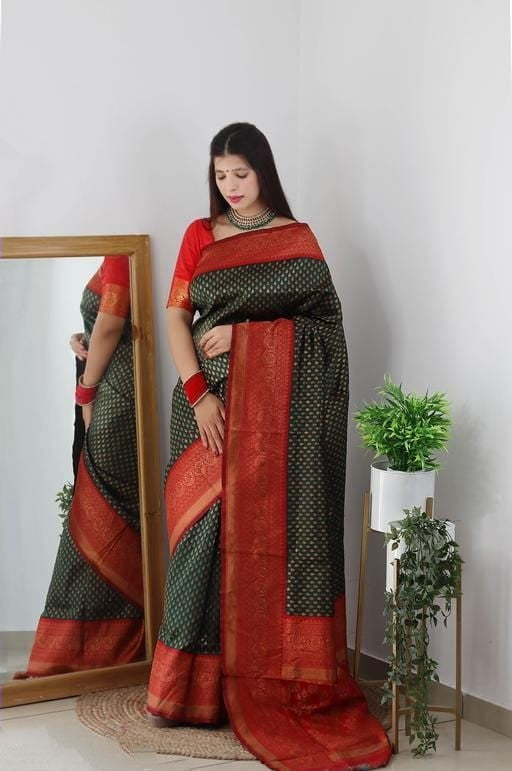 Captivating Dark Green Color Soft Lichi Silk Saree With Blouse Piece