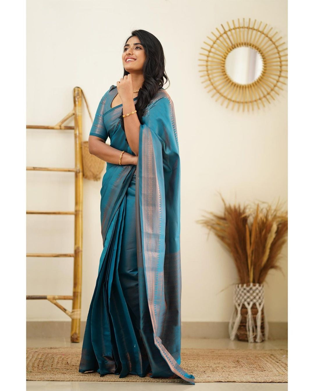 Dazzling Firozi Color Soft Lichi Silk Saree With Blouse Piece