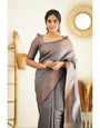 Inviting Grey Color Soft Lichi Silk Saree With Blouse Piece