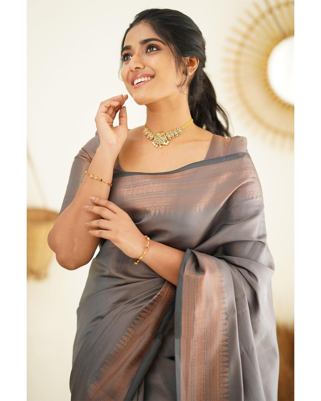 Inviting Grey Color Soft Lichi Silk Saree With Blouse Piece