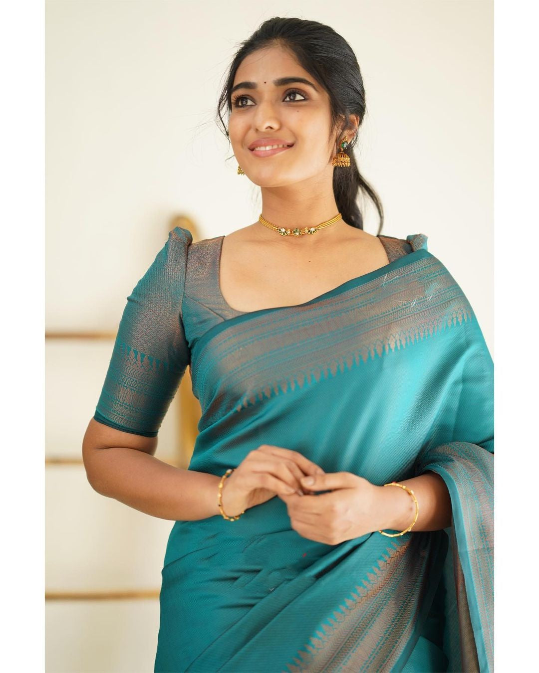 Glowing Rama Green Color Soft Lichi Silk Saree With Blouse Piece