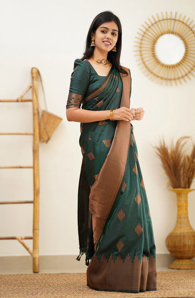 Splendid Dark Green Color Soft Lichi Silk Saree With Blouse Piece