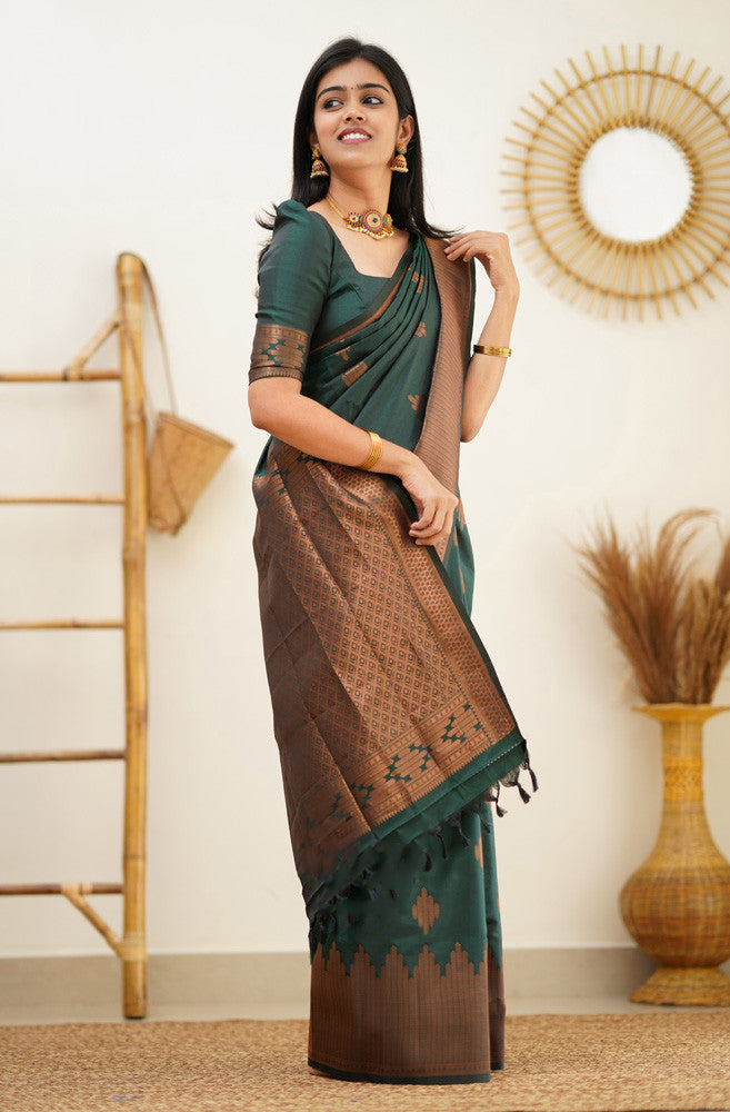 Splendid Dark Green Color Soft Lichi Silk Saree With Blouse Piece