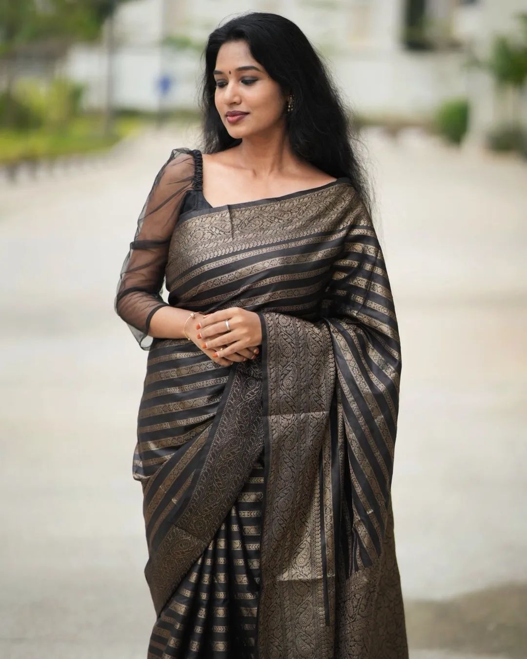 Lustrous Black Color Soft Lichi Silk Saree With Blouse Piece