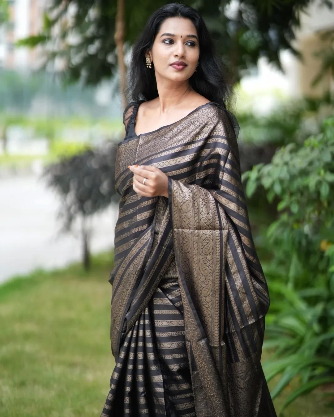 Lustrous Black Color Soft Lichi Silk Saree With Blouse Piece