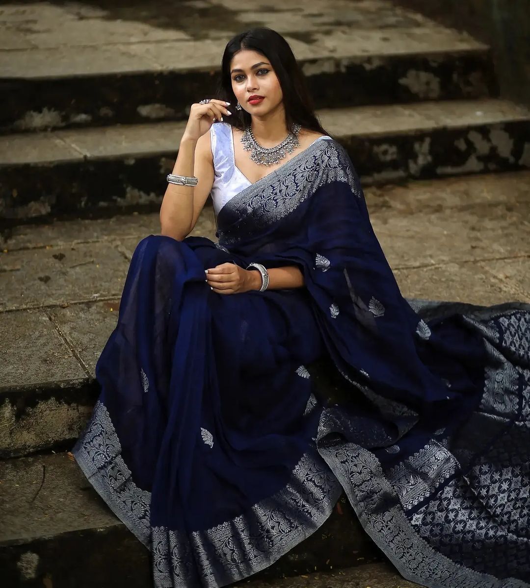 Enigmatic Navy Blue Color Soft Lichi Silk Saree With Blouse Piece