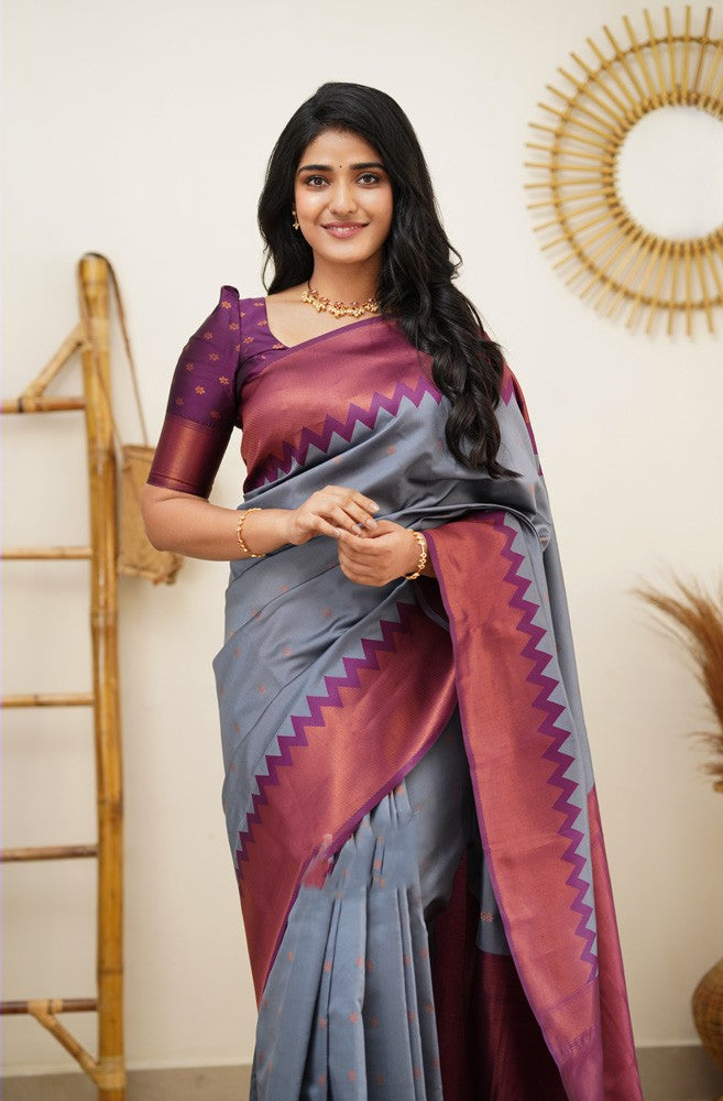 Entrancing Grey Color Soft Lichi Silk Saree With Blouse Piece