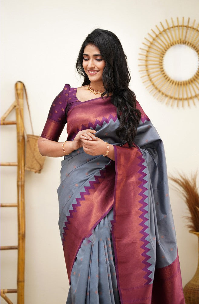 Entrancing Grey Color Soft Lichi Silk Saree With Blouse Piece