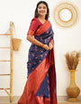 Lustrous Navy Blue Color Banarasi Soft Silk Saree With Blouse Piece